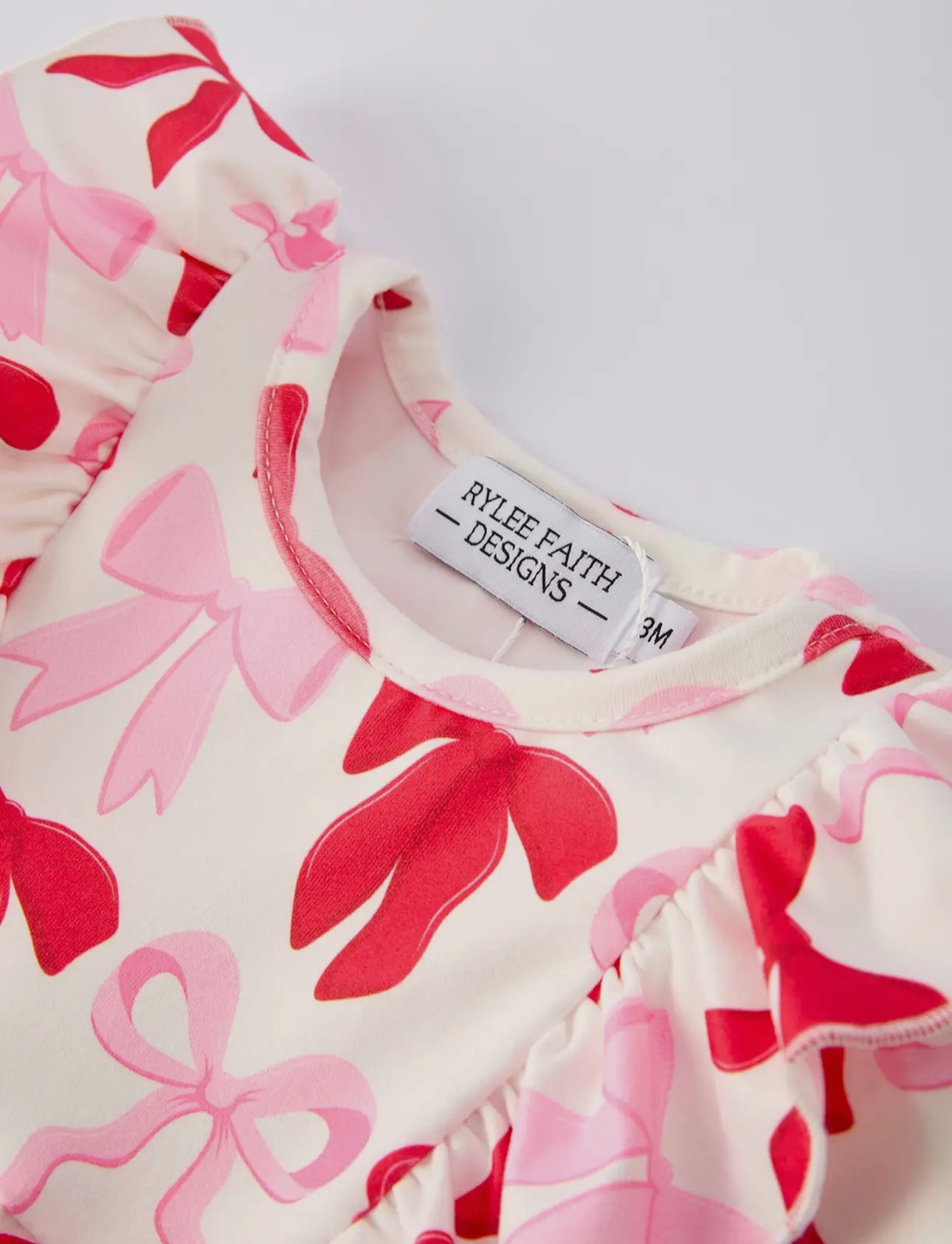 Pretty in Bows & Ruffles Long Sleeve Bubble