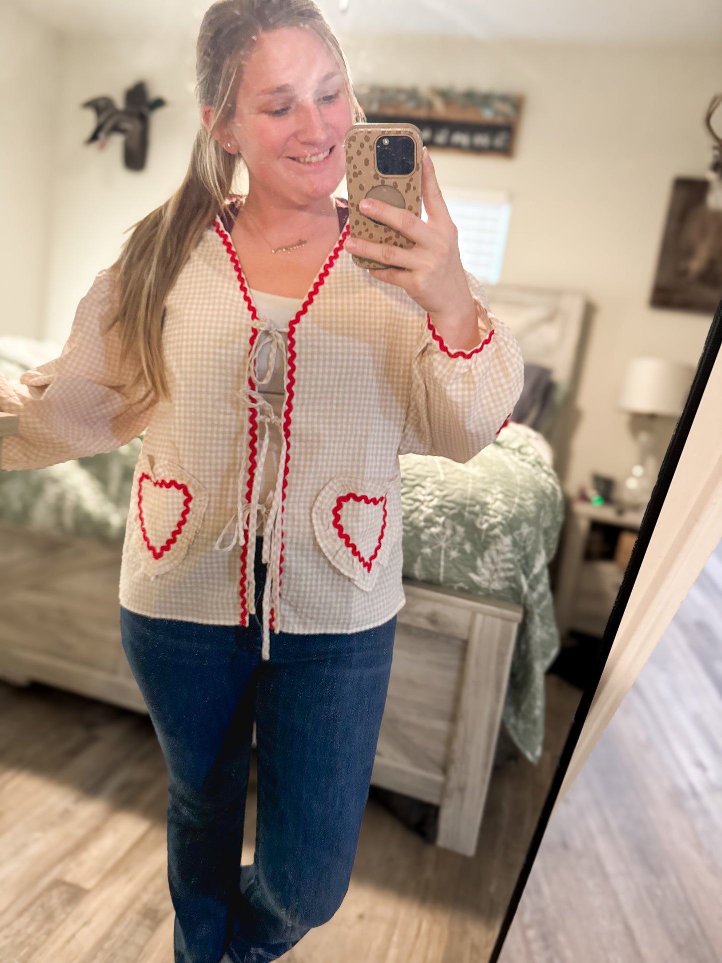 Ric Rac heart-inspired patching Gingham tie front blouse